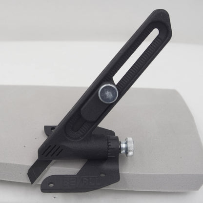 A Black Plastic Tool containing a 9mm breakoff blade