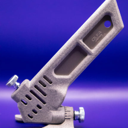 Gray Blade holder on Blue Background