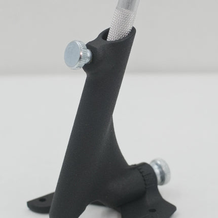 Black metal tool on a white background