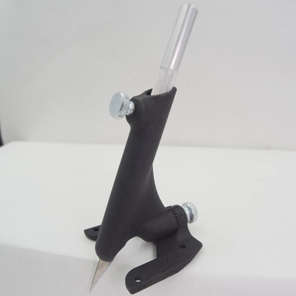 Black metal tool with a cylindrical handle on a white background